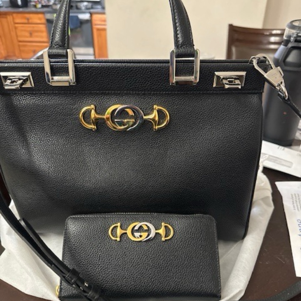 BrandNew-Black Grainy Leather Gold/Silver Bag Features A Push Lock Set